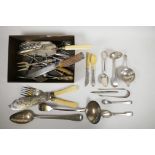 A collection of hallmarked silver and silver plated flatware, including strainers, fish servers,