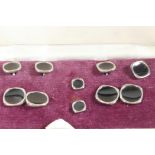 A box of silver plate and black enamelled cufflinks and studs