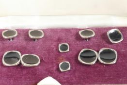 A box of silver plate and black enamelled cufflinks and studs