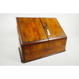 A handsome Victorian stationery/writing box in burr walnut, c.1890, with sloped doors and a