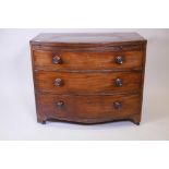 A C19th mahogany bow front chest of three graduated drawers and brushing slide, reduced, 38" x