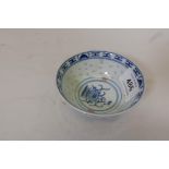 A Chinese rice bowl with blue and white decoration, and gilt and iron red highlights, signed to