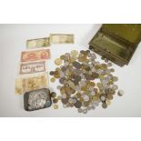 A tin of (detectorist finds) 6p pieces together with a cash box containing World coins and banknotes