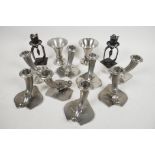 A quantity of Swedish pewter candlesticks on leaf bases, 3½" high, together with a pair of pewter