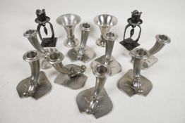 A quantity of Swedish pewter candlesticks on leaf bases, 3½" high, together with a pair of pewter