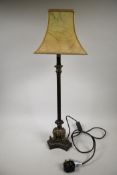 A late C20th bronze toleware candlestick table lamp, with cast brass elephants to the base and
