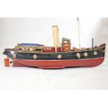 A scratch built wood scale model of a tug, Waterguard of H.M. Customs & Excise, length 36, beam