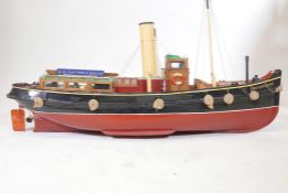 A scratch built wood scale model of a tug, Waterguard of H.M. Customs & Excise, length 36, beam