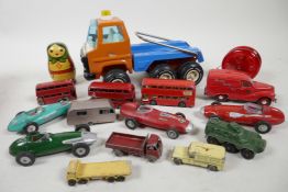 A box of vintage toys including 1960s die cast Corgi racing cars, three Lesney London Buses, a