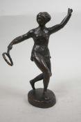 A 1950s Russian USSR bronze sculpture of a strong female tennis player, propaganda piece,