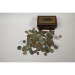 A cash box containing a quantity of of coins, mainly British including detector finds