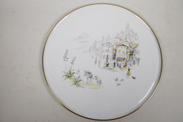 A Hutschenreuther porcelain charger decorated with an Italian mountaintop village scene, 12½"