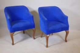 A pair of 1930s tub chairs upholstered in blue