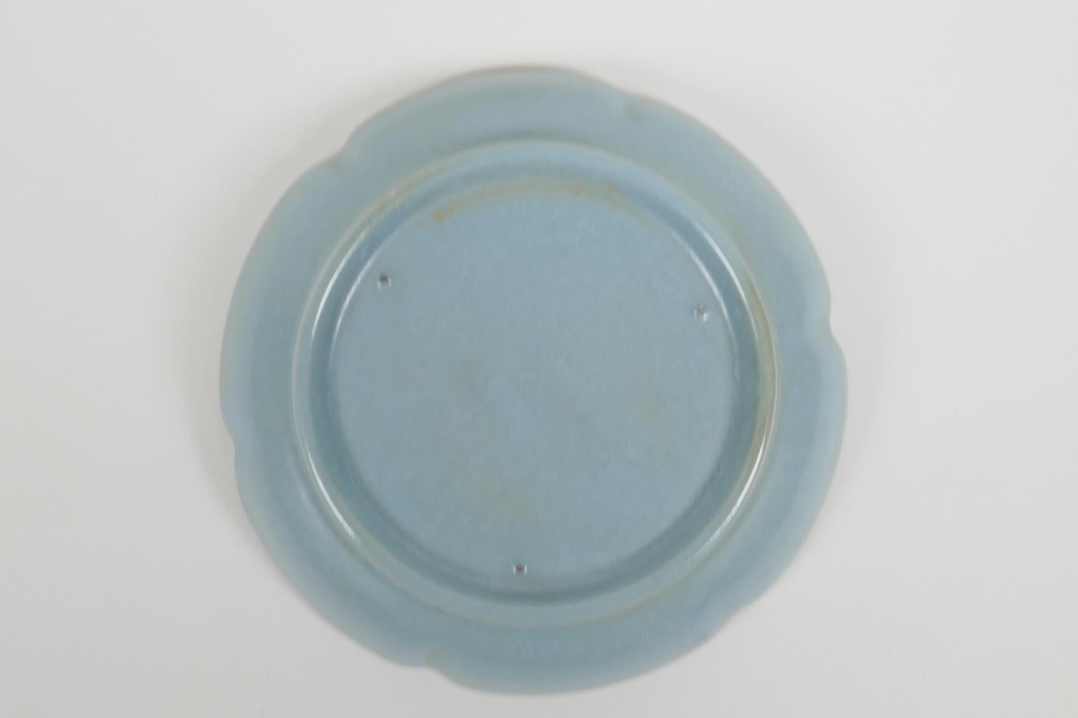 A Chinese Ru ware style porcelain dish with a shaped rim and chased and engraved character - Image 3 of 3