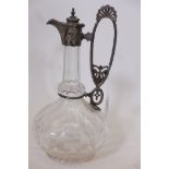 A late C19th cut glass claret jug with silver plated mount and star cut base, 11" high
