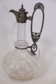 A late C19th cut glass claret jug with silver plated mount and star cut base, 11" high