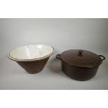 A Le Creuset casserole pot with lid, brown finish, 12" diameter x 6" high, together with a C19th
