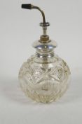 A cut glass atomiser with hallmarked silver mount, 6½" high