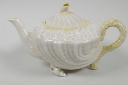 A Belleek porcelain shell shaped teapot, 3rd period black factory mark, 4½" high