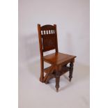 A Victorian metamorphic library step-chair in walnut, the hinged seat allowing the frame to