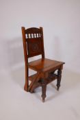 A Victorian metamorphic library step-chair in walnut, the hinged seat allowing the frame to