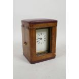 A French brass cased carriage clock and fitted travel case, crack to glass side panel, clock 3" x