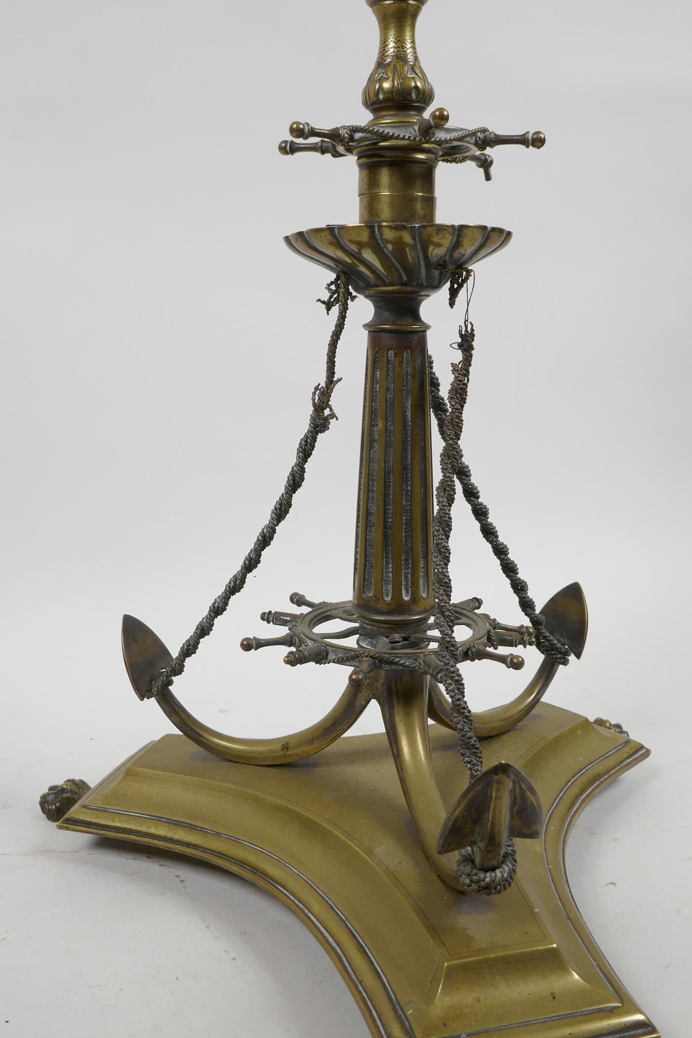 An unusual brass centrepiece on a triform base with nautical decoration, 19½" high, A/F - Image 4 of 5
