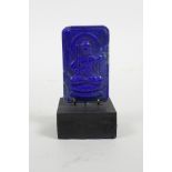 A carved and mounted Lapis ornament in the form of Buddha, 3" high