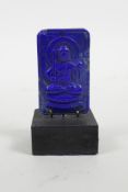 A carved and mounted Lapis ornament in the form of Buddha, 3" high