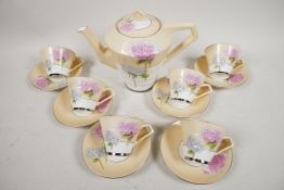 A Paragon Art Deco coffee service comprising coffee pot and six cups and saucers of conical form