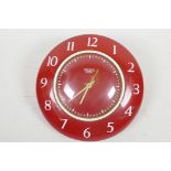 A Smiths 'Selectric' red enamelled electric wall clock, c1950s, 8" diameter