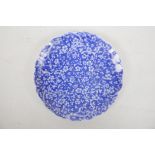 A Chinese porcelain plate with shaped edge and all over decoration of prunus and cracked ice, 8½?