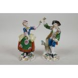 A pair of continental porcelain figures of a dancing girl and boy, 5½" high, minor losses