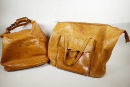 Two mid C20th American leather holdalls of sturdy construction in thick tan hide, largest 20" x 15",