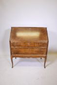 An early C20th Swedish birch veneered bureau with a fitted interior over two long drawers, 35" x 18"