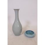 A Chinese celadon glazed porcelain pear shaped vase, 16½" high, together with a blue crackle