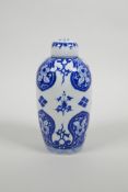 A Chinese blue and white porcelain jar and cover with floral decoration, six character mark to base,