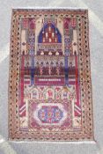 An Afghan hand woven blonde wool prayer mat with mosque decoration, 34" x 56"