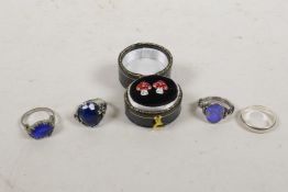 A pair of silver toadstool earrings set with paste stones and a silver ring, two silver rings set