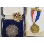 A King Edward VIII Coronation medal together with a bejewelled gilt crown brooch and a Hong Kong