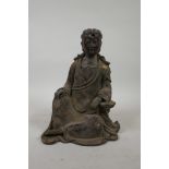 A Chinese bronzed metal figure of Quan Yin, with distressed gilt patina, six character mark verso,