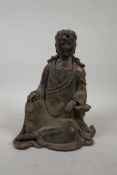 A Chinese bronzed metal figure of Quan Yin, with distressed gilt patina, six character mark verso,