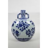 A Chinese blue and white porcelain two handled moon flask with fruit decoration, six character