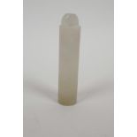 A Chinese white jade toggle, 3½" long