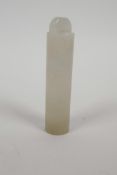 A Chinese white jade toggle, 3½" long