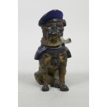 A cold painted spelter inkwell in the form of a pipe smoking sailor dog, 4" high