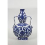 A Chinese blue and white porcelain two handled double gourd flask with lotus decoration, seal mark
