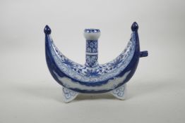A Chinese blue and white porcelain crescent moon shaped powder flask with floral decoration, 4