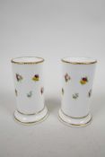 A pair of early C19th Meissen style scatter flower vases, gold edged, no marks to base, one damaged,