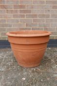 A large French terracotta pot, 15" high x 20½" diameter